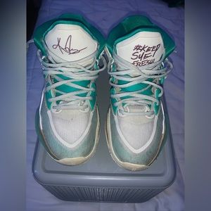 Sue Bird x Kyrie Infinity Golden basketball shoes